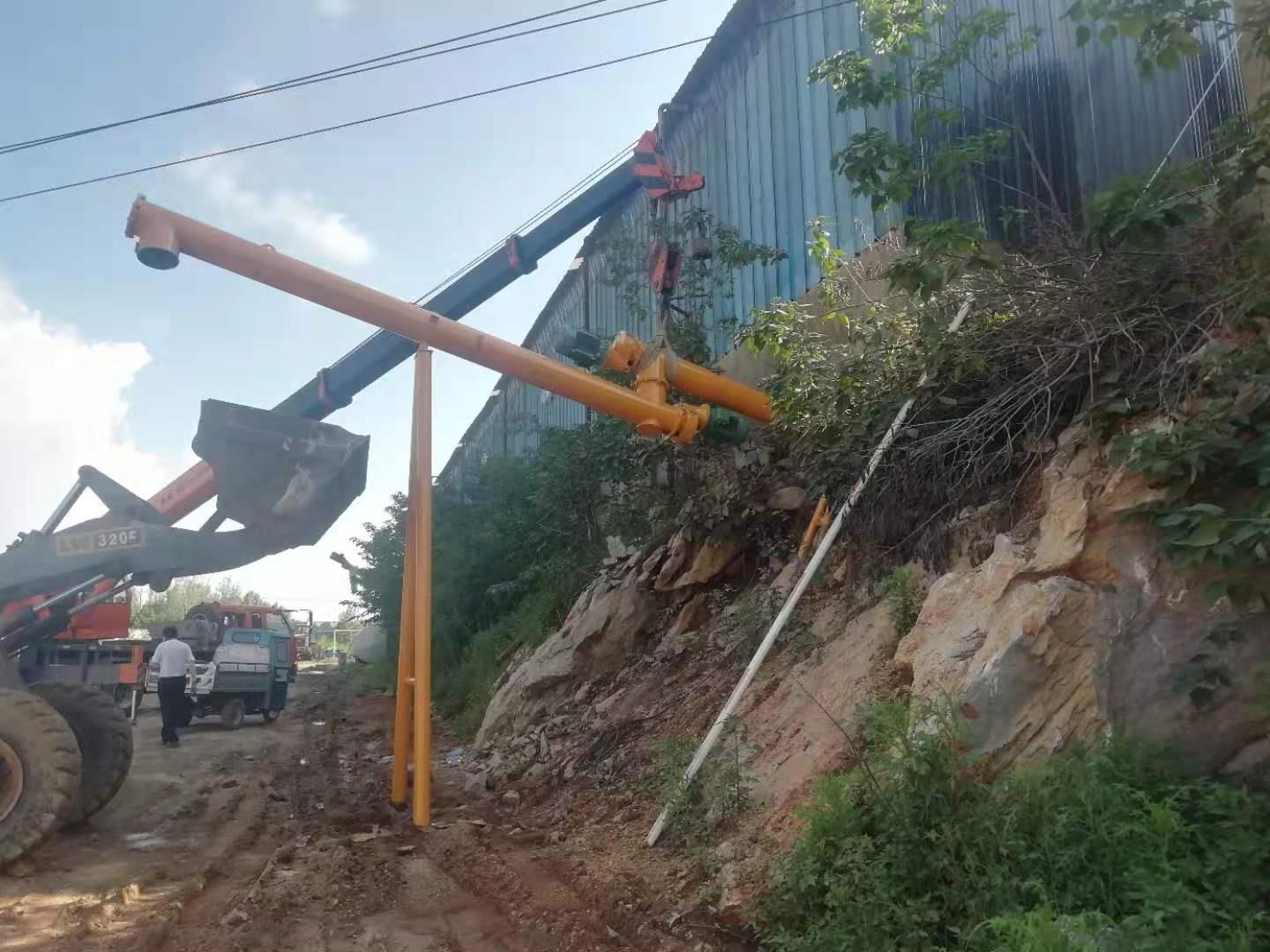 搭接螺旋輸送機(jī)用于粉煤灰?guī)煅b車